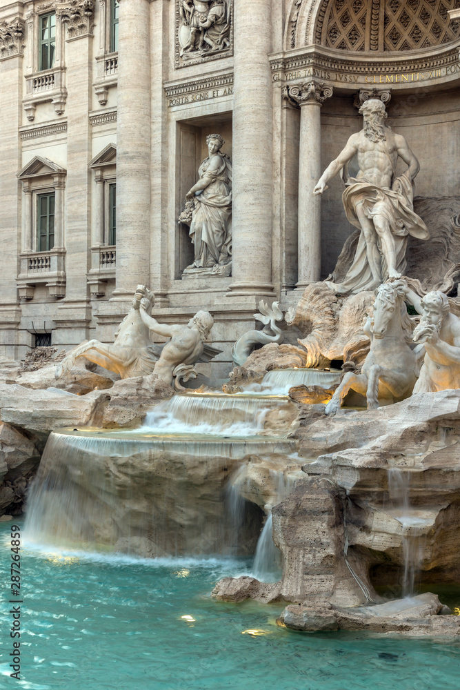 Sunset view of Trevi Fountain  in city of Rome, Italy