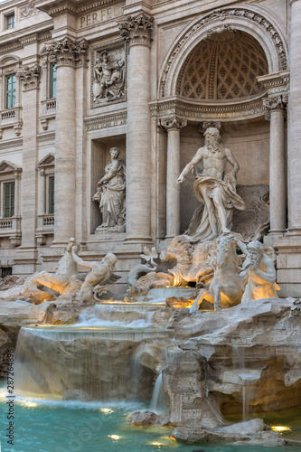 Sunset view of Trevi Fountain in city of Rome, Italy