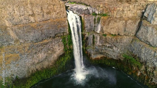Aerial view of the famous Palouse Falls in Washington state into a rock canyon