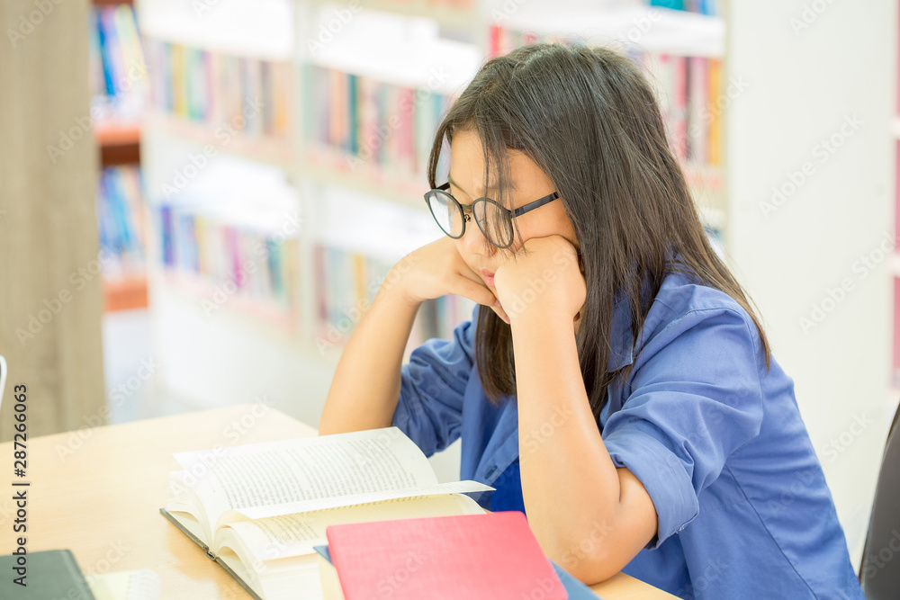 Young brown hair woman in glasses read book Young brown hair woman in glasses read book