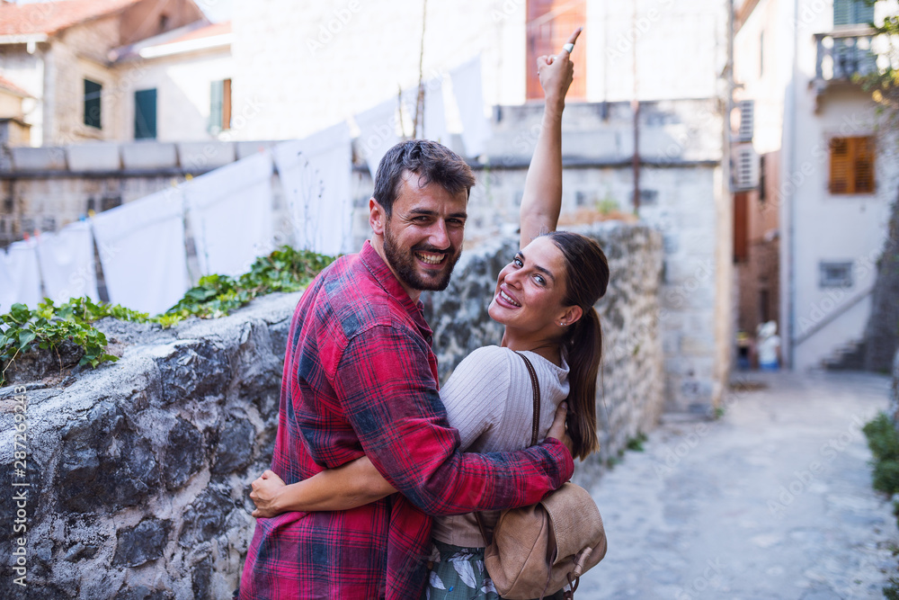 Tourist couple on a vacation,exploring town Tourist couple on a vacation,exploring town