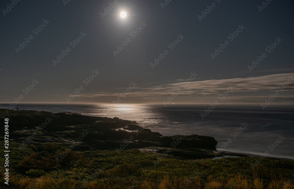 Full moon over the Pacific Ocean shore, Yachats Oregon Full moon over the Pacific Ocean shore, Yachats Oregon