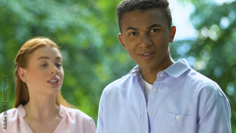 Ginger girl scolding boyfriend, demanding respect in relations, equal attitude Ginger girl scolding boyfriend, demanding respect in relations, equal attitude