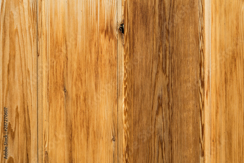 texture background of a laminated wood board surface © Yi