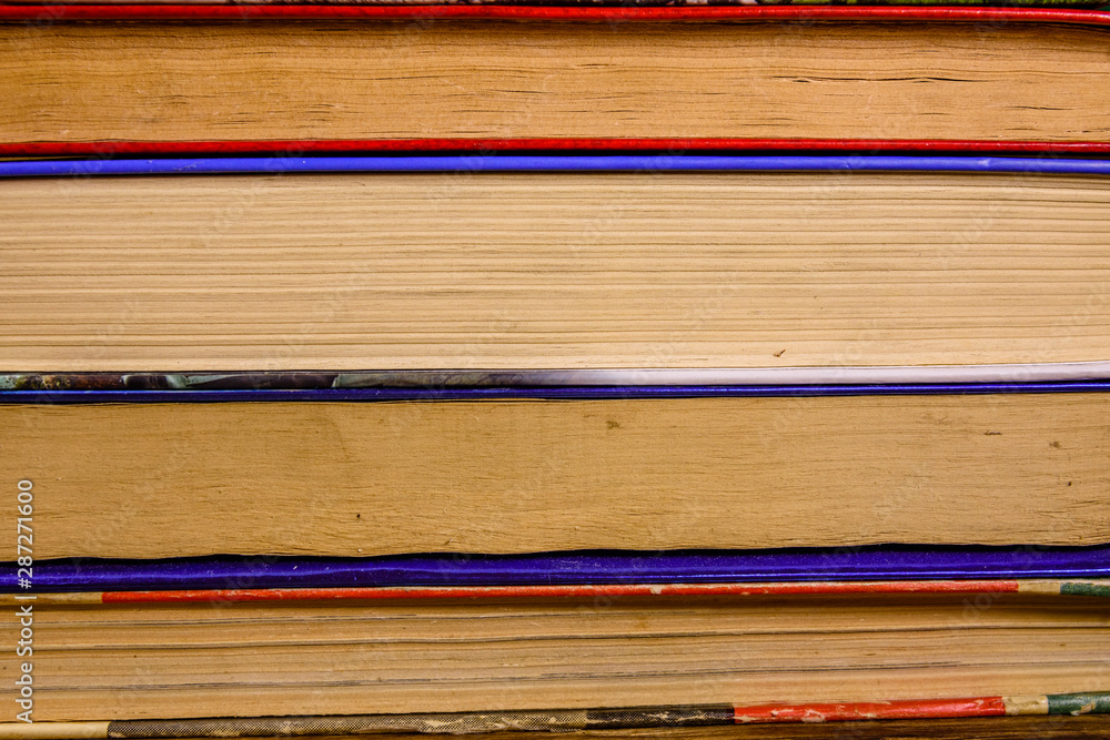 Fototapeta premium Stack of the different old books for background
