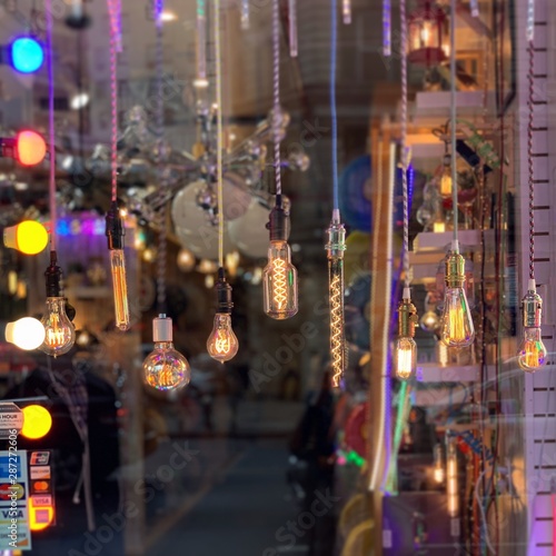 Urban shop storefront selling interesting colorful light bulbs