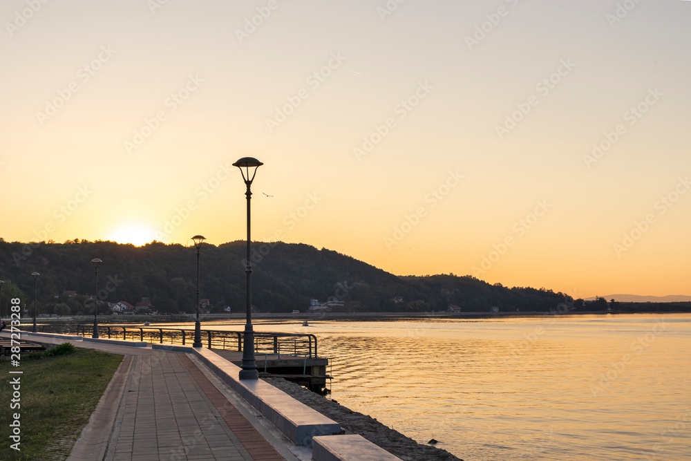 Sunset view of Danube River passing through a town of Golubac, Serbia