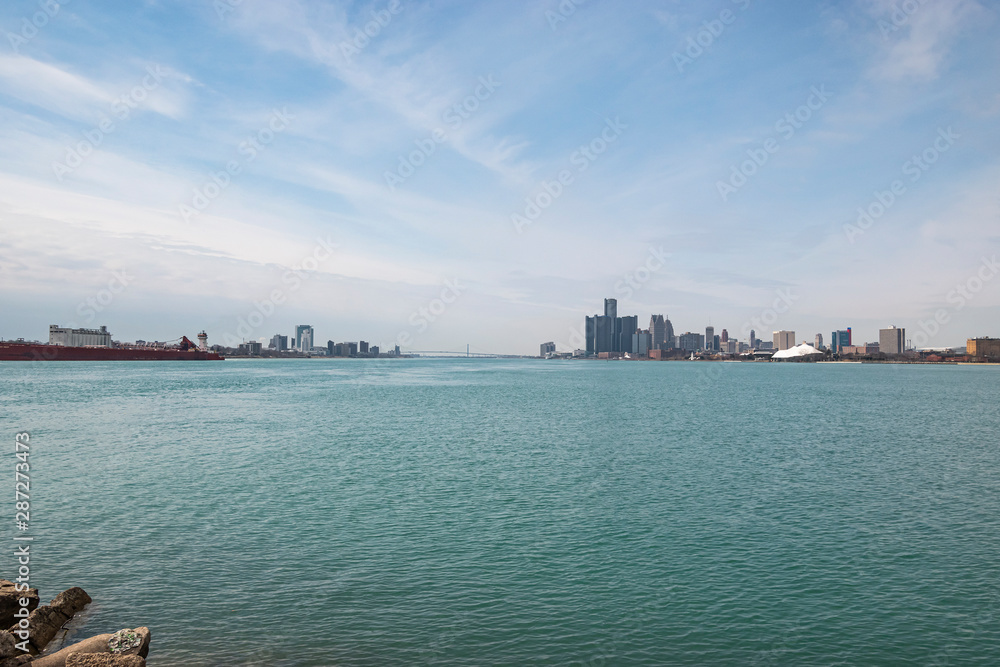 Panoramic view of the Detroit Windsor skyline with the Ambassador Bridge connecting the United States with Canada.