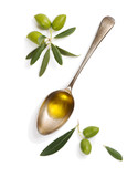 Olive fruit and spoon with olive oil.