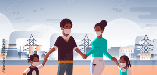 parents and children wearing face masks toxic gas air pollution industry smog polluted environment concept family walking outdoor plant pipe dirty smoke background portrait horizontal