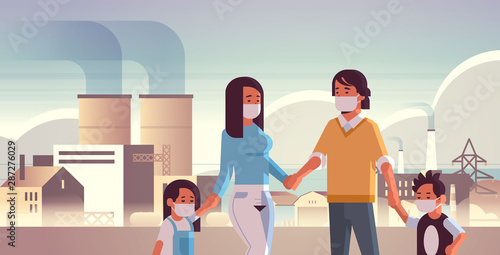 parents and children wearing face masks toxic gas air pollution industry smog polluted environment concept family walking outdoor plant pipe dirty smoke background portrait horizontal