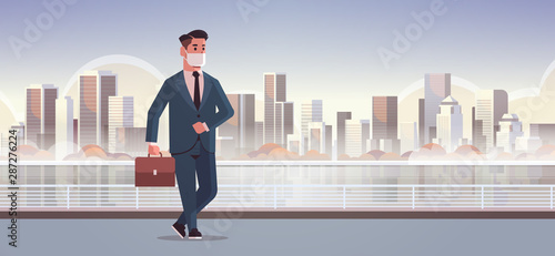 businessman wearing face mask toxic gas air pollution industry smog danger polluted environment concept business man walking outdoor cityscape skyline full length horizontal