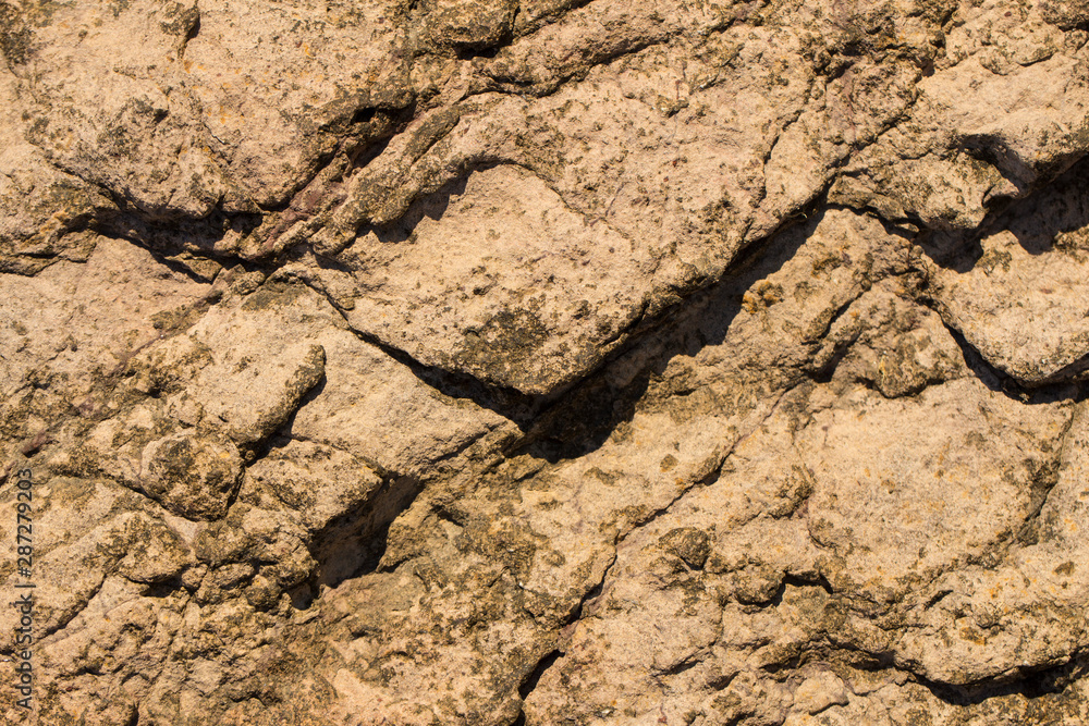 Rock plate. Colored stone surface. Wall of the house. Geology and Metamorphic rocks. Rock plate. Colored stone surface. Wall of the house. Geology and Metamorphic rocks.
