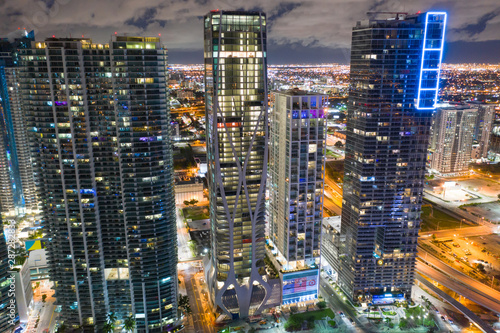 Aerial drone photo Downtown Miami skyscrapers modern architecture with neon lights