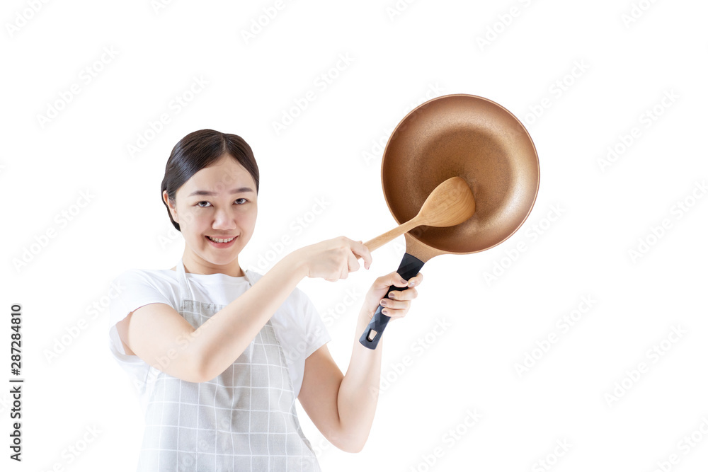 Young Asian woman's portrait in cooking concept close up, isolated on white background. Young Asian woman's portrait in cooking concept close up, isolated on white background.