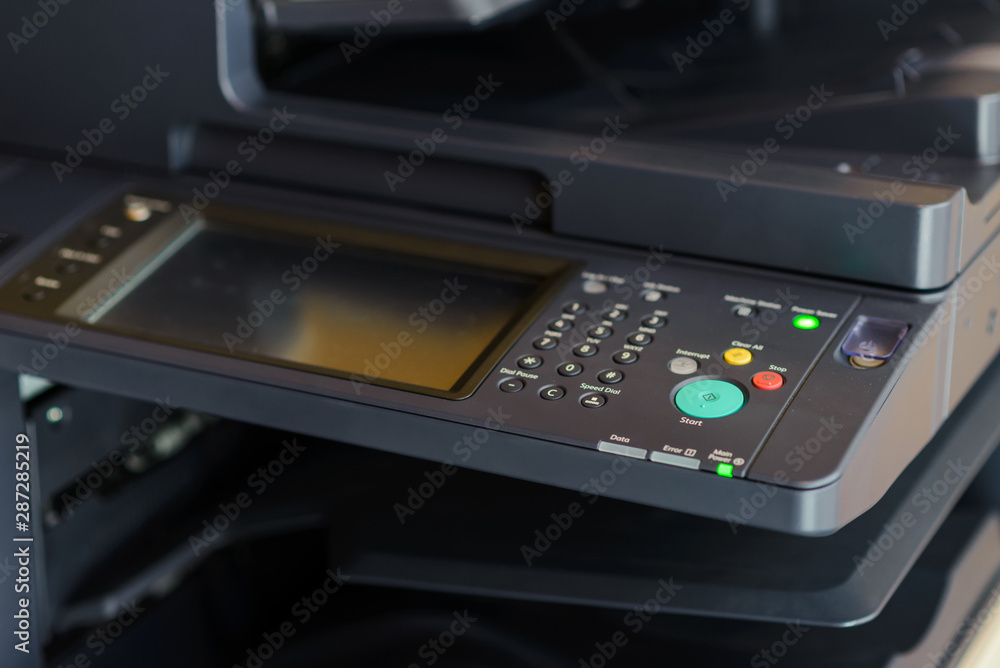 button on panel of copy machine or photocopier in office button on panel of copy machine or photocopier in office