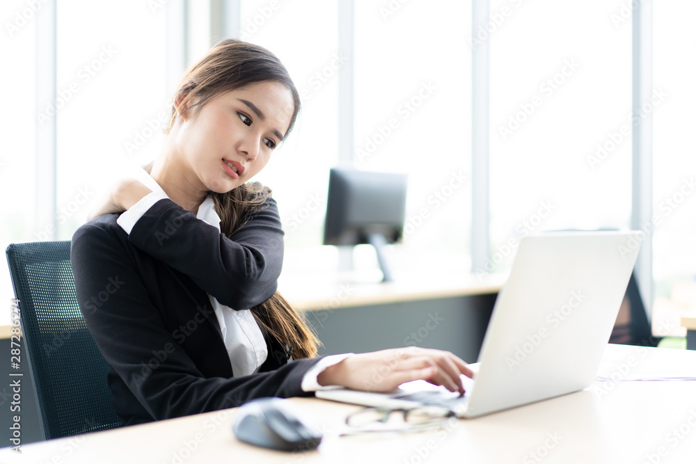 Smart confident businessman and businesswoman in the modern workplace posing for a photography in natural lighting. Modern and professional businesspeople in office concept. Smart confident businessman and businesswoman in the modern workplace posing for a photography in natural lighting. Modern and professional businesspeople in office concept.