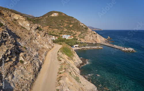 Aerial view on mountain road to cretan village Almirida and Mediterannean sea. Crete, Greece.