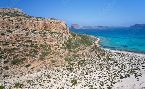 Aerial view on Tigani cape and Balos lagoon with Gramvoussa island on background. Dimos Kissamou, Chania prefecture, Crete, Greece. photo