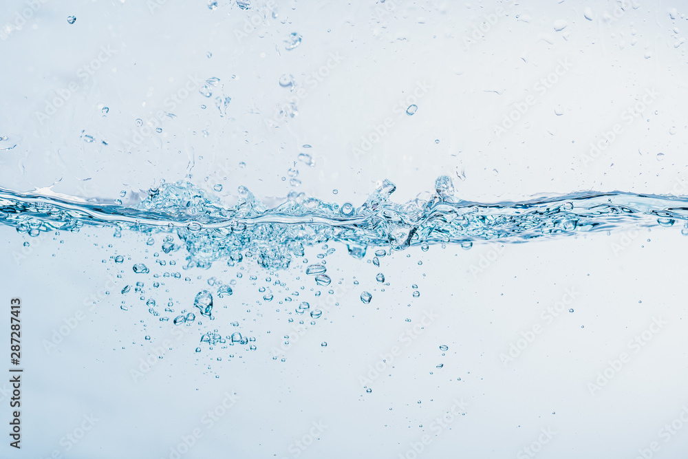 Water splash close up of splash of water forming shape isolated on white background. Water splash close up of splash of water forming shape isolated on white background.