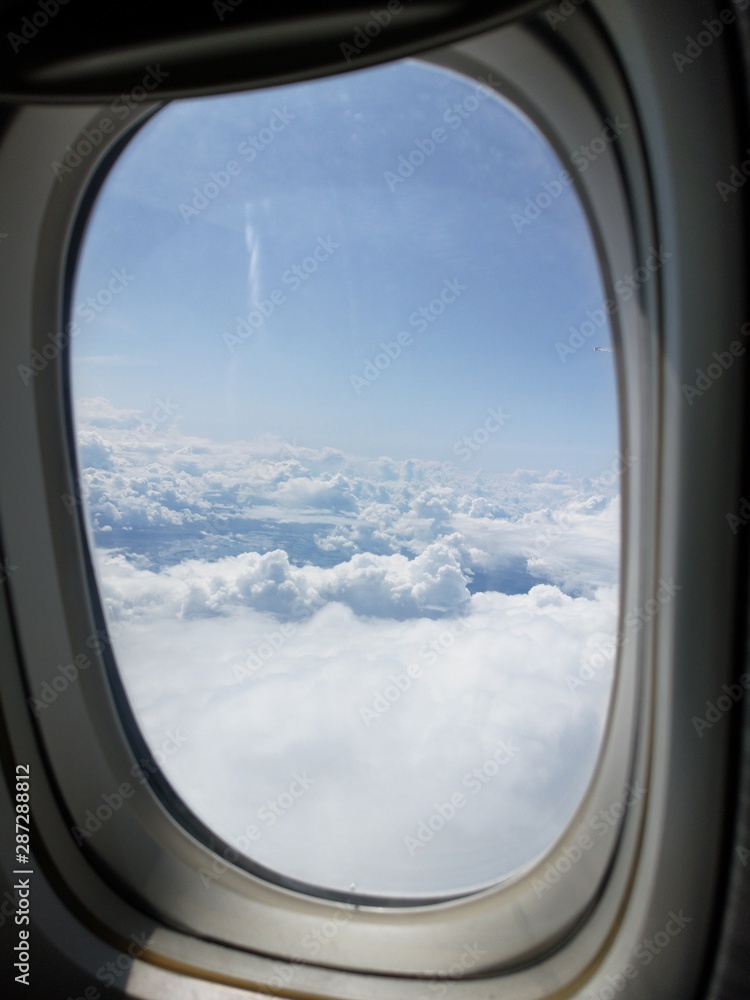 Cotton clouds from the plane's eiumator Cotton clouds from the plane's eiumator