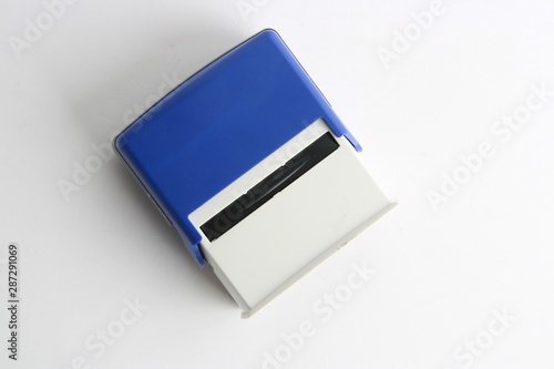 Obraz na płótnie Automatic ink stamp manufactured in blue plastic w salonie