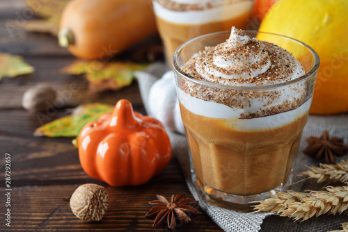 Pumpkin latte decorated whipped cream
