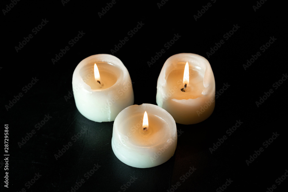 mourning candles on black background mourning candles on black background