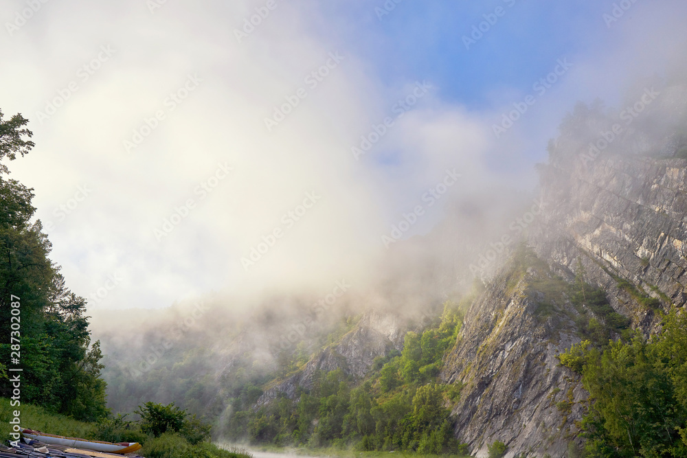 Morning fog on a mountain river