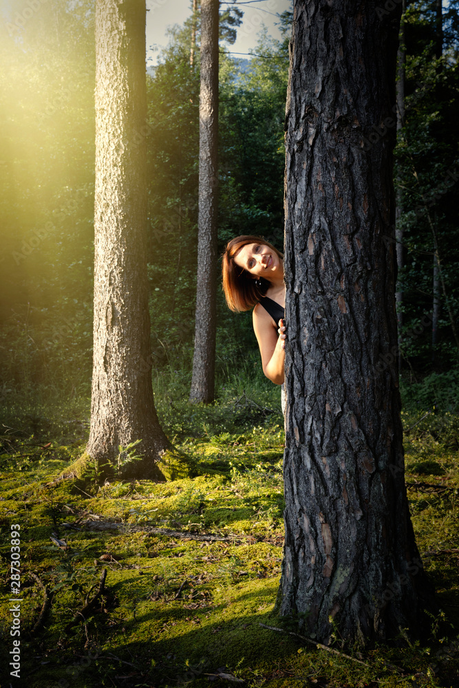 Active woman having a daily walk into the forest. Take care of your mental and psychical body. Active woman having a daily walk into the forest. Take care of your mental and psychical body.