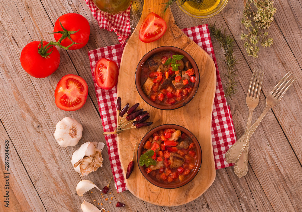 Marinated pork loin in tomato sauce. Marinated pork loin in tomato sauce.