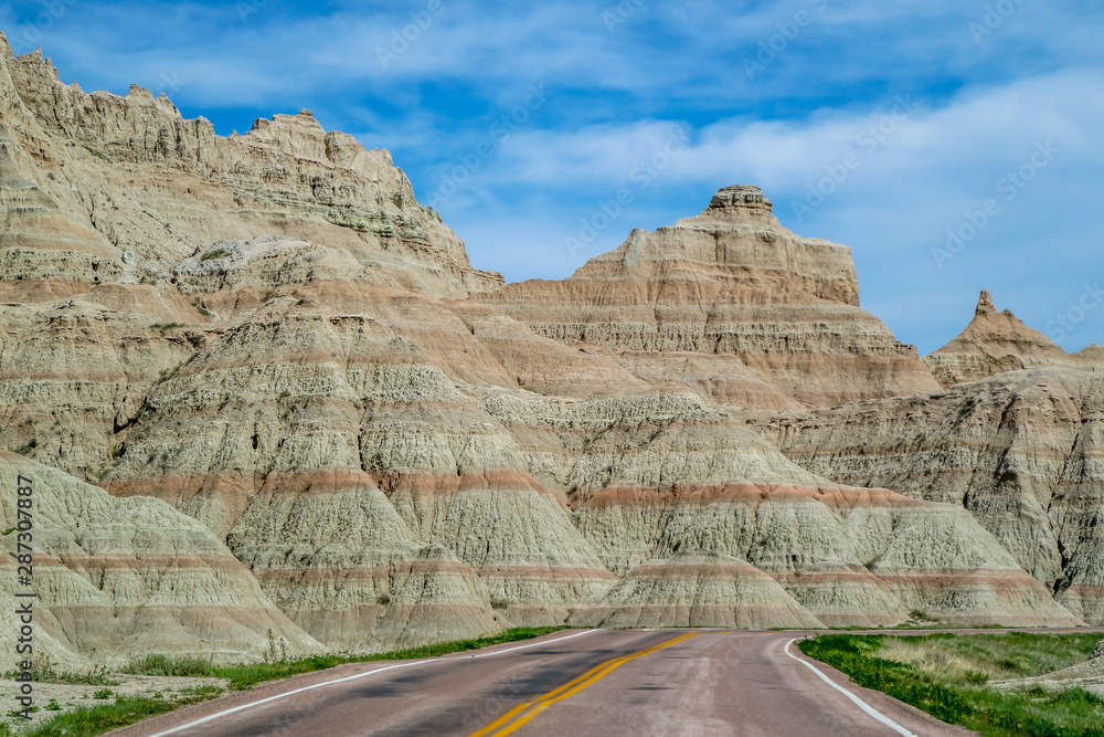 A long way down the road of Badlands National Park, South Dakota A long way down the road of Badlands National Park, South Dakota