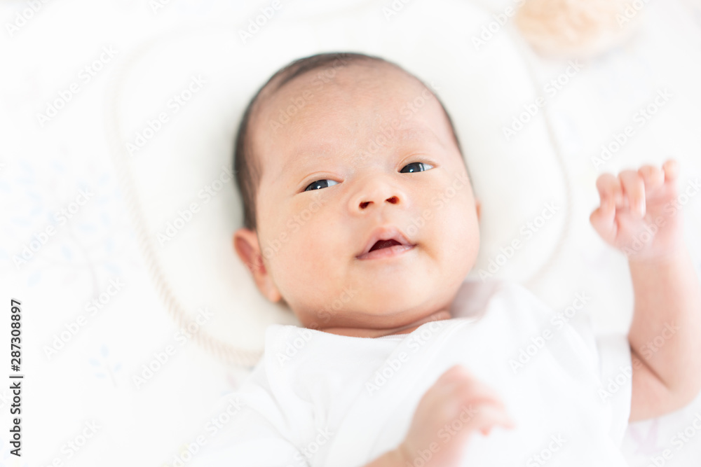Baby lying on the crib Baby lying on the crib