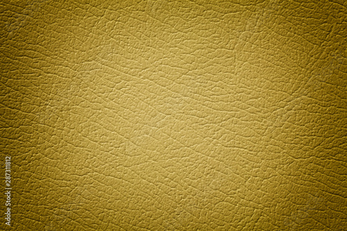 Yellow leather texture background with pattern, closeup