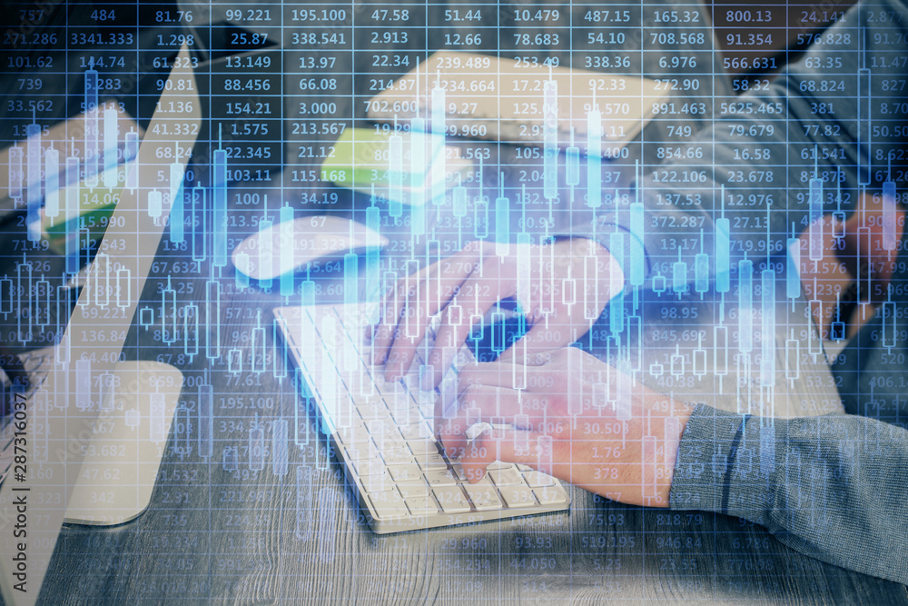 Stock graph with businessman typing on computer in office on background. Concept of analysis. Double exposure. Stock graph with businessman typing on computer in office on background. Concept of analysis. Double exposure.