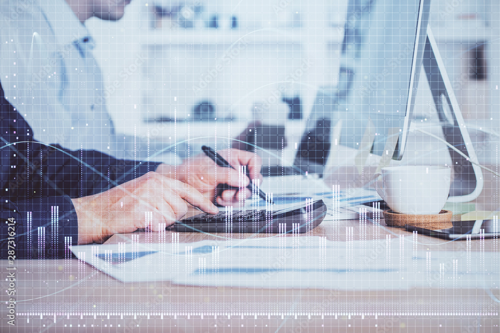 Forex graph with businessman working on computer in office on background. Concept of hardworking. Closeup. Multi exposure. Forex graph with businessman working on computer in office on background. Concept of hardworking. Closeup. Multi exposure.