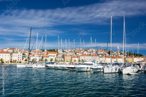 yachts moored at the pier in harbour of Losinj town, Croatia. © phant