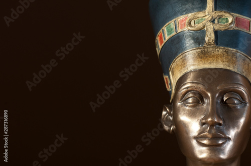 cleopatra in close up, black background