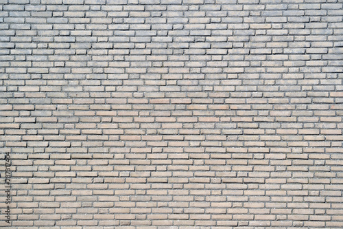 yellow colored brick wall for background use