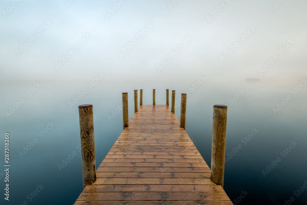 Naklejka premium Ashness Gate Jetty in the morning mist, Lake District