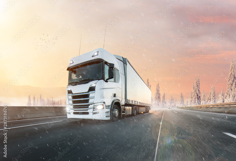 Truck with container on winter highway, cargo transportation concept. Shaving effect. Truck with container on winter highway, cargo transportation concept. Shaving effect.