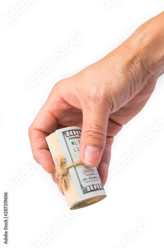 hand holding a roll of 100 usd