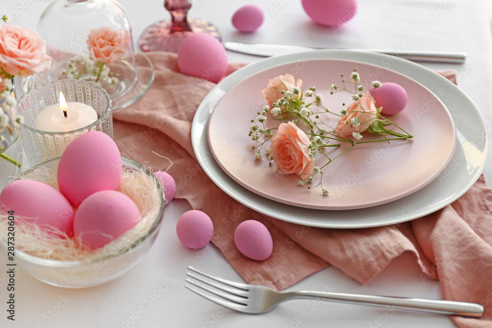 Beautiful table setting for Easter celebration Beautiful table setting for Easter celebration
