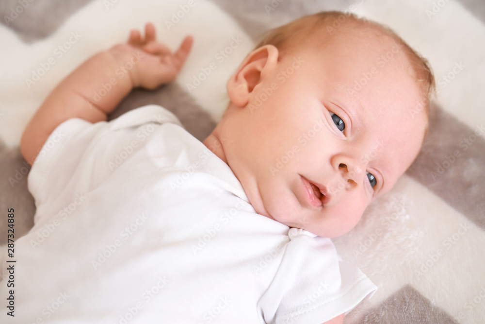 Cute little baby lying on bed Cute little baby lying on bed