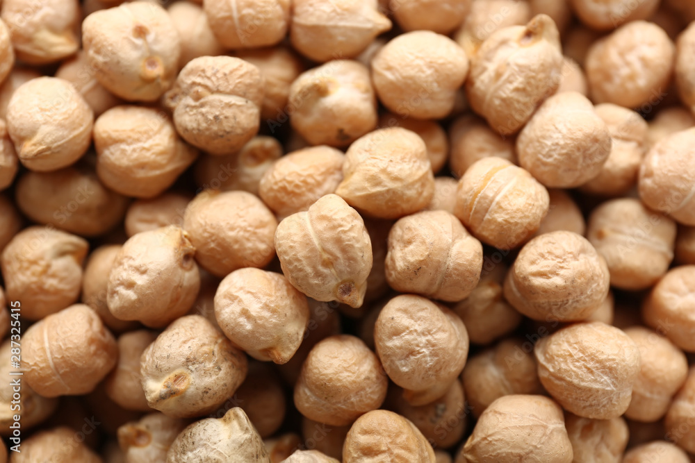 Many raw chickpea as background Many raw chickpea as background