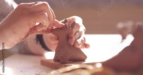 Sculpting of a clay toy