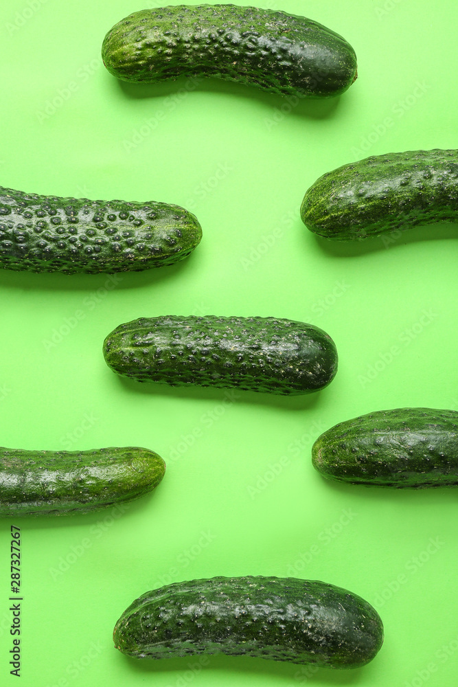 Many ripe cucumbers on color background Many ripe cucumbers on color background