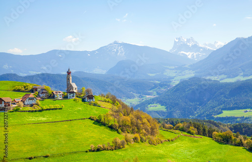 Nicholas chapel in small village in the Dolomites alps, South Tyrol, Italy. photo