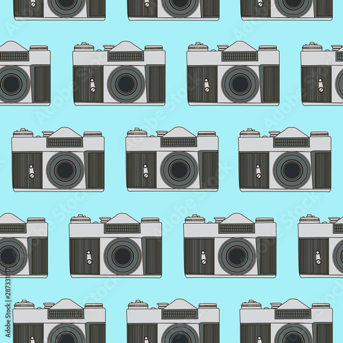Decorative print with camera on blue backdrop. Seamless pattern with lined up cameras. 