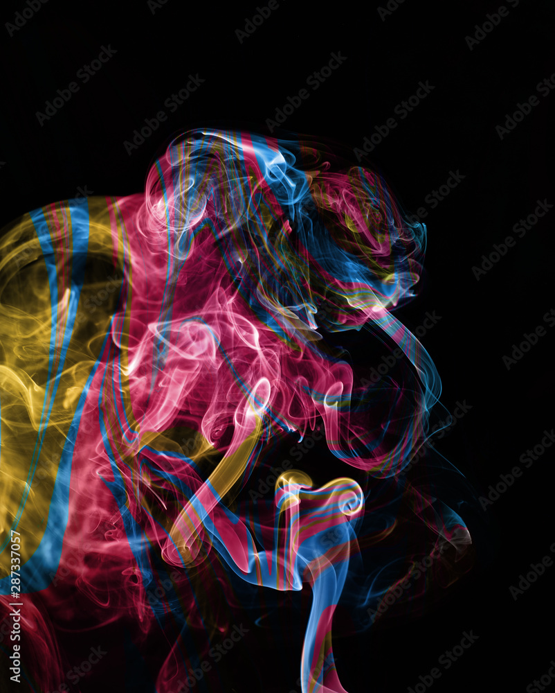 abstraction colored smoke on black background